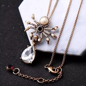 Pearl Crystal Retro Spider holding Skull Necklace